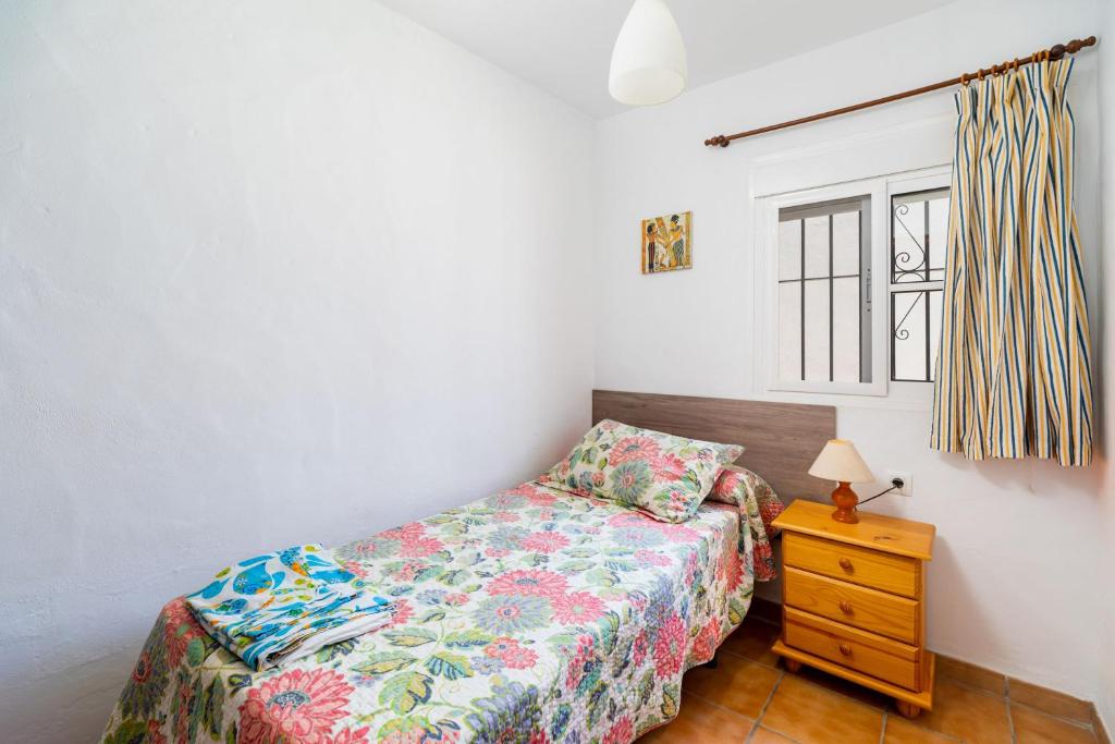 Postel nebo postele na pokoji v ubytování Casa Carlos con Piscina Privada en Conil
