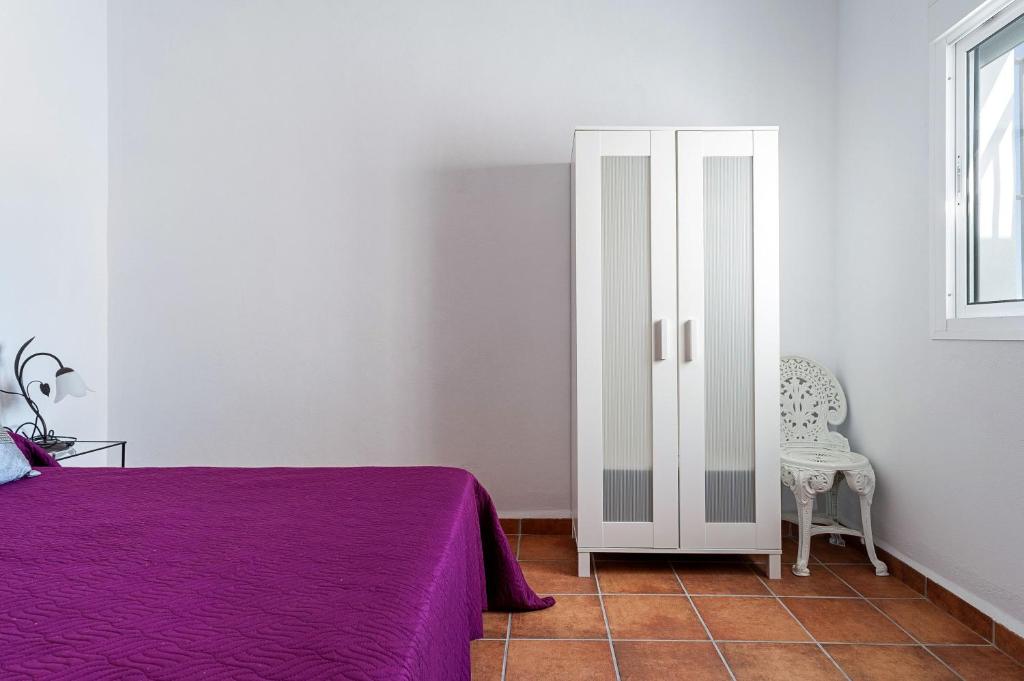 Posteľ alebo postele v izbe v ubytovaní Casa Marquez - Sólo Familias