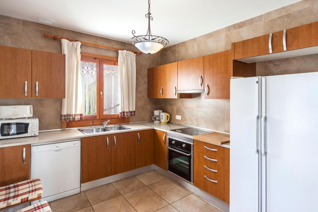 Kuchyň nebo kuchyňský kout v ubytování Villa Rote