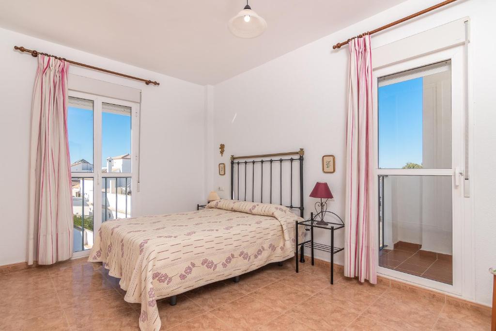 Postel nebo postele na pokoji v ubytování Apartamento las Torres