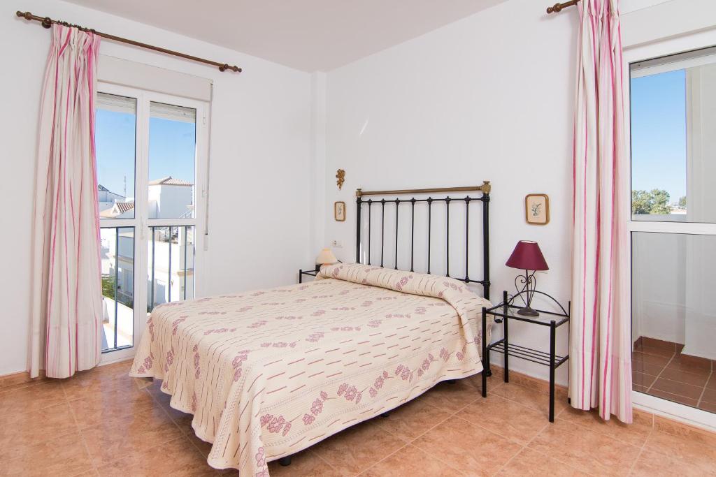 Postel nebo postele na pokoji v ubytování Apartamento las Torres