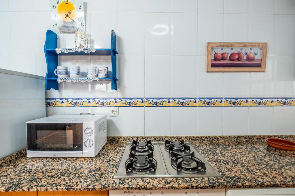 Kuchyň nebo kuchyňský kout v ubytování Apartamento las Torres