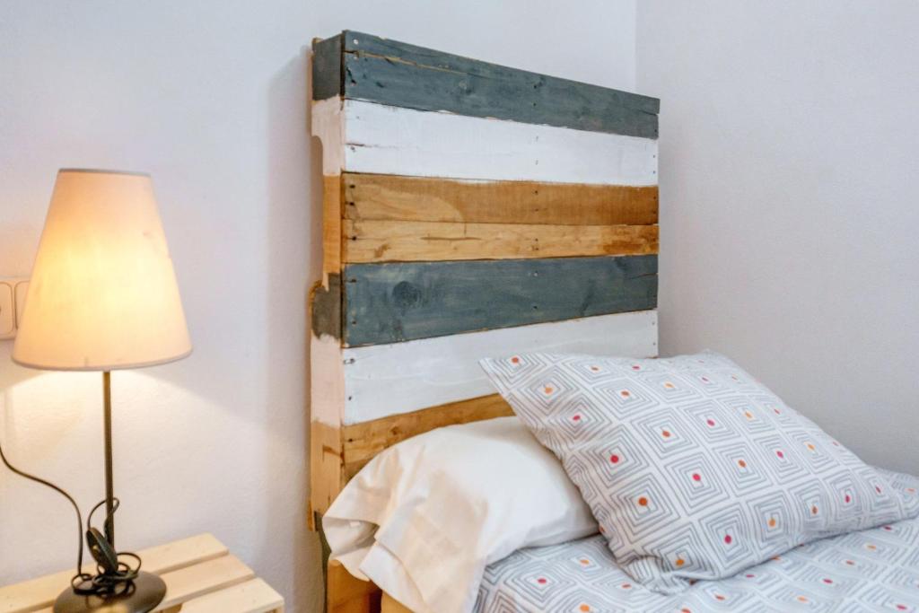 Postel nebo postele na pokoji v ubytování La Casita