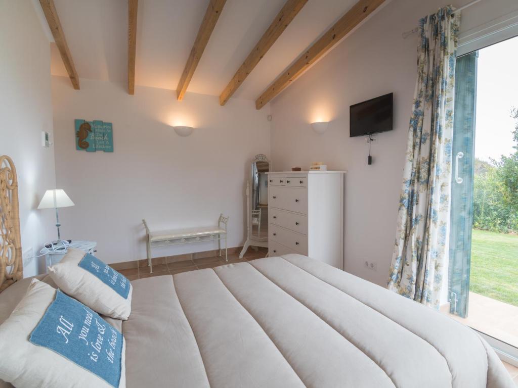 Postel nebo postele na pokoji v ubytování Villa De Lujo Frente A La Playa