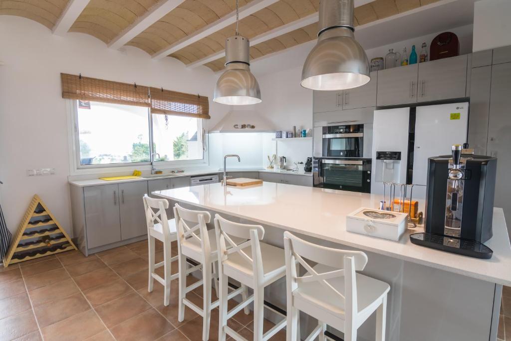 Kuchyň nebo kuchyňský kout v ubytování Villa De Lujo Frente A La Playa
