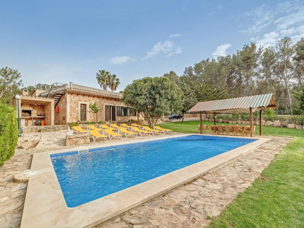 an image of a villa with a swimming pool at El Bosque in Urbanicacion ses palmeres