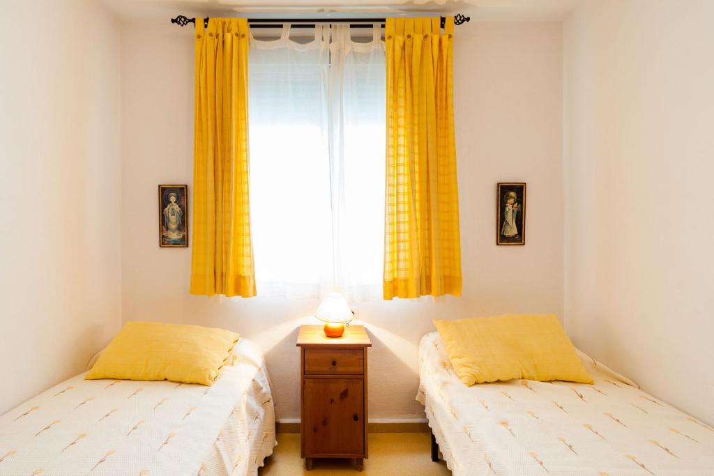 Posteľ alebo postele v izbe v ubytovaní Duplex A Fontanilla