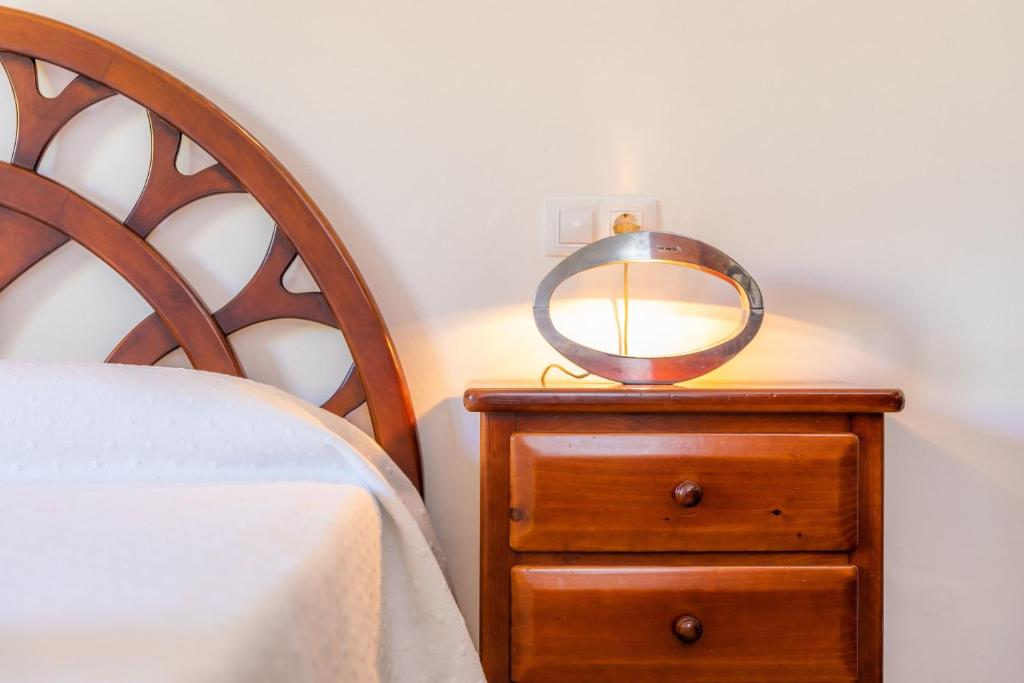A bed or beds in a room at Margarita