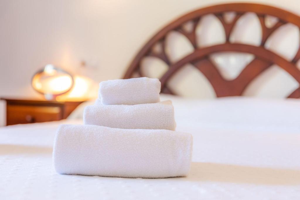 A bed or beds in a room at Margarita