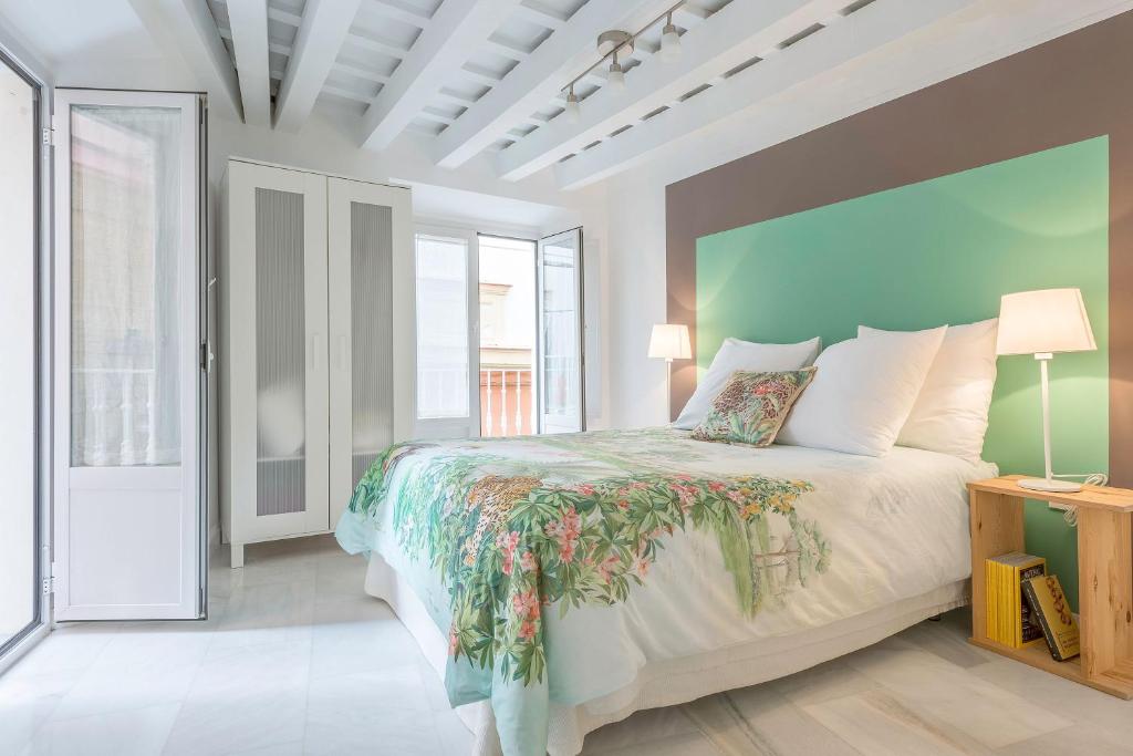 Posteľ alebo postele v izbe v ubytovaní Luminoso apartamento en el centro de Cádiz