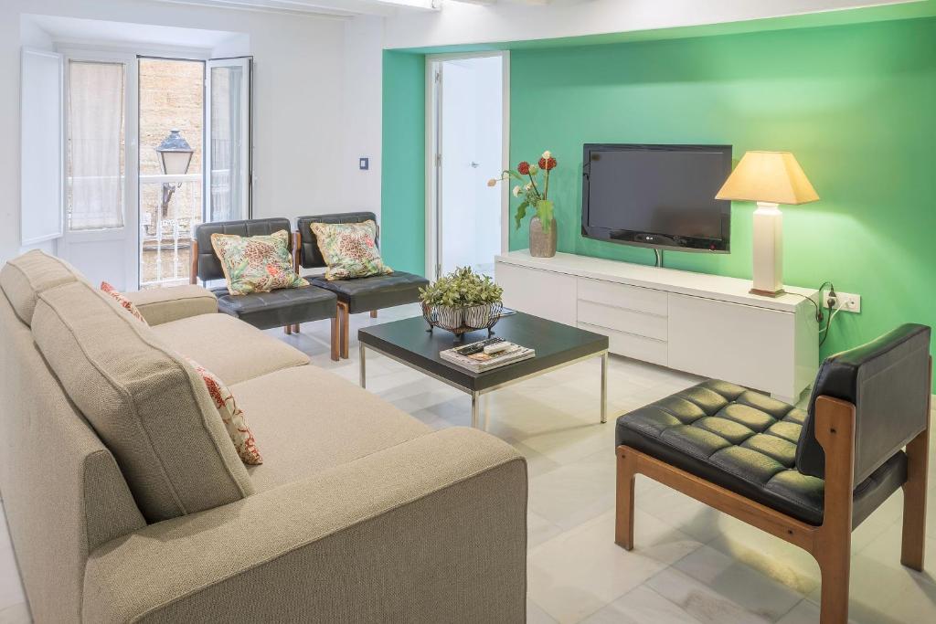Televízia a/alebo spoločenská miestnosť v ubytovaní Luminoso apartamento en el centro de Cádiz