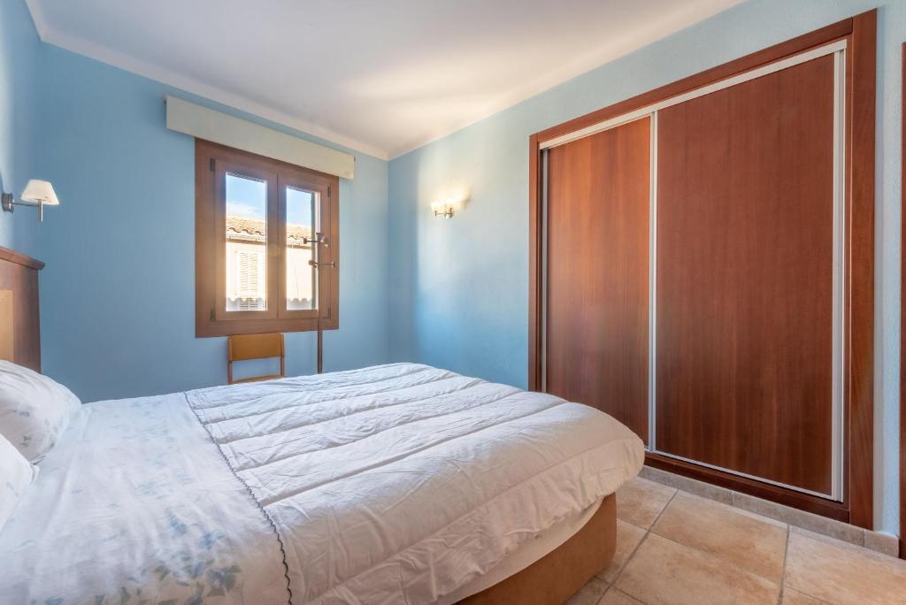 Postel nebo postele na pokoji v ubytování Caril