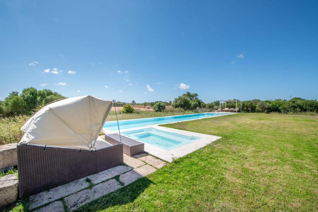 The swimming pool at or close to Son Coranta