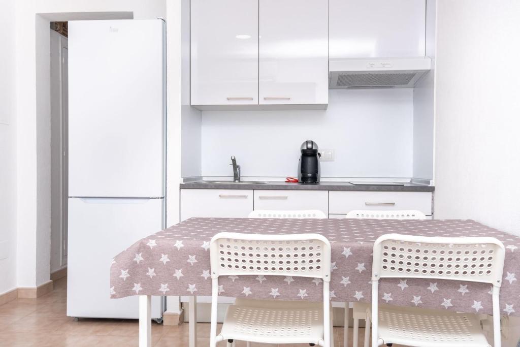 Kuchyň nebo kuchyňský kout v ubytování Apartamento Cala Piques