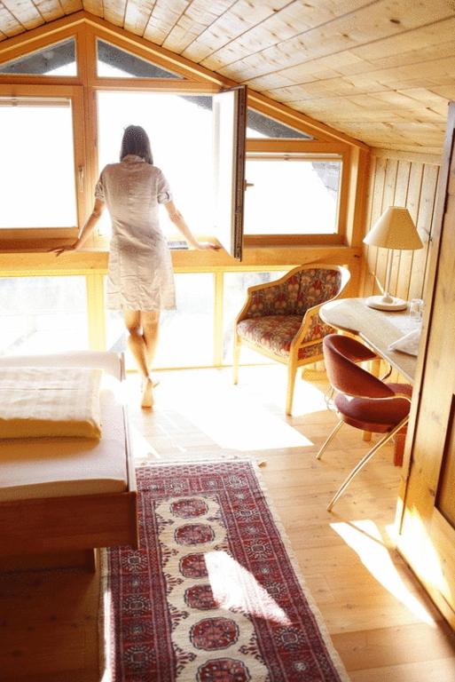 Postel nebo postele na pokoji v ubytování Biohotel Grafenast
