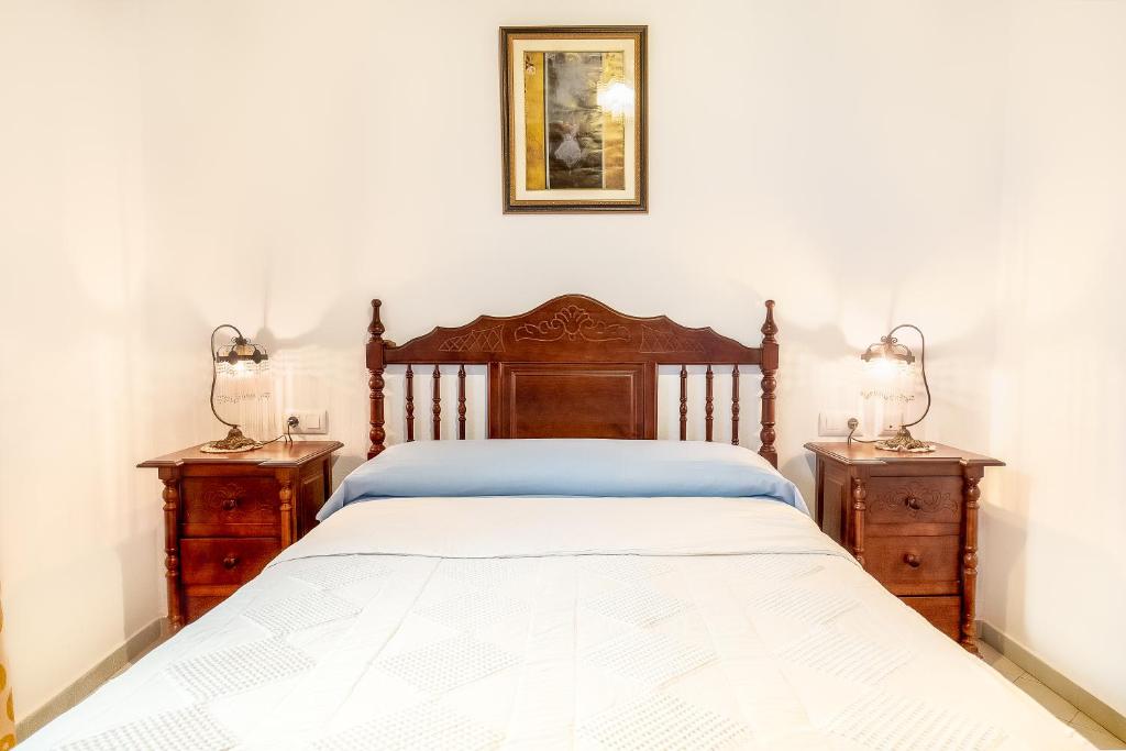 Postel nebo postele na pokoji v ubytování Casa Pepa