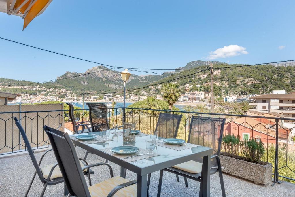 a table and chairs on a balcony with a view at Can Joi 12 in Sóller