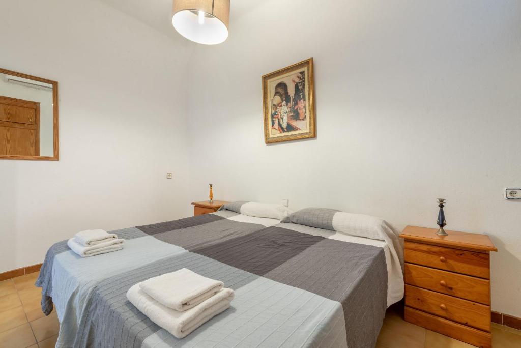 Postel nebo postele na pokoji v ubytování Nafeti