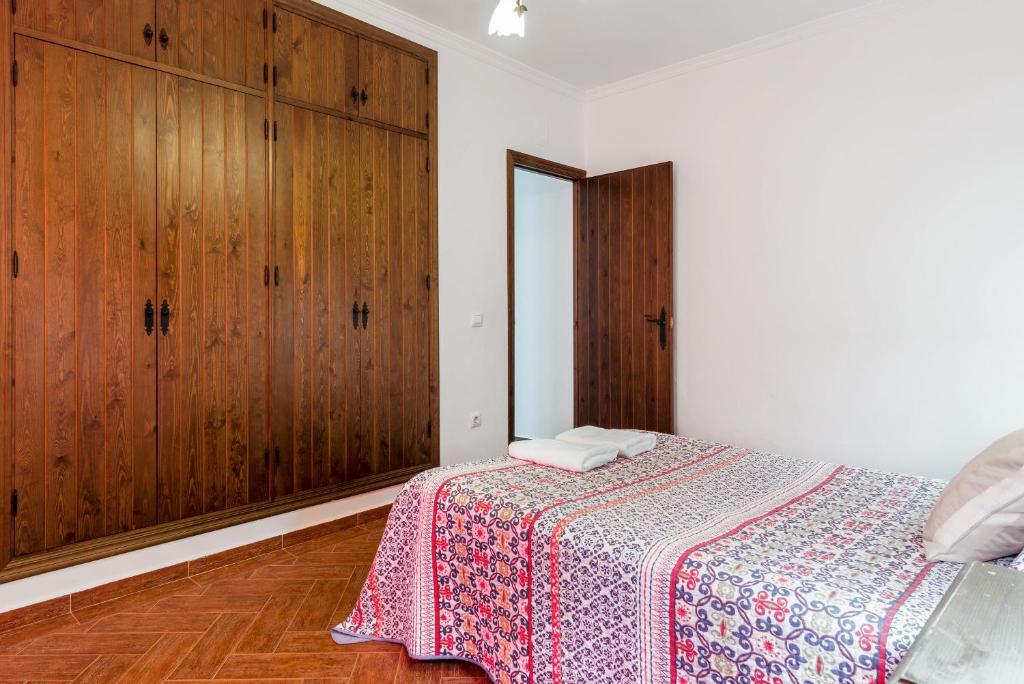Posteľ alebo postele v izbe v ubytovaní Casa Familiar La Lobita 1