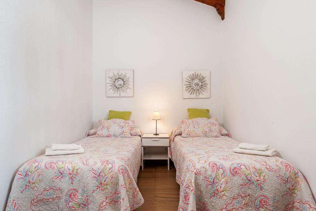 Posteľ alebo postele v izbe v ubytovaní Apartamento en la playa con terraza