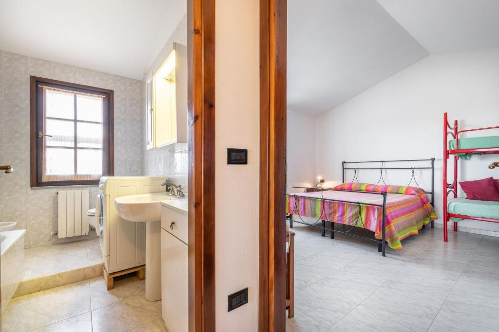 Posteľ alebo postele v izbe v ubytovaní Casa Vacanza Anna