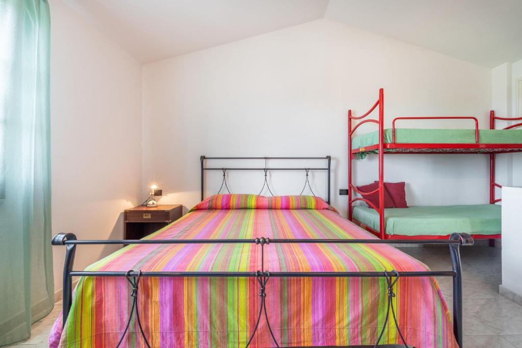 Posteľ alebo postele v izbe v ubytovaní Casa Vacanza Anna