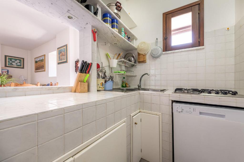 Kuchyňa alebo kuchynka v ubytovaní Casa Vacanza Anna