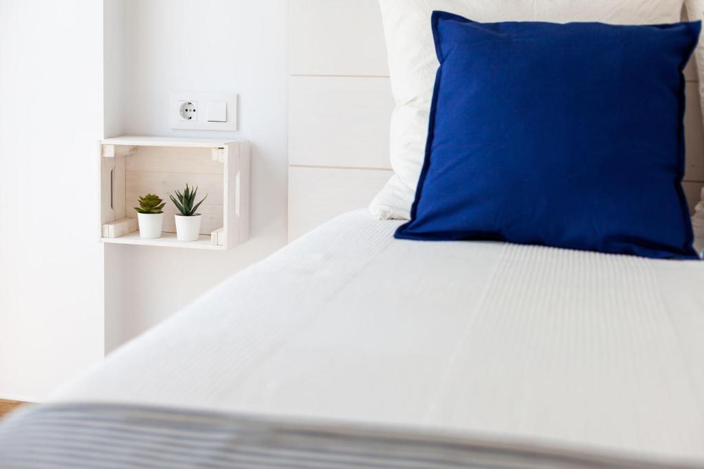 Postel nebo postele na pokoji v ubytování Apartamento Sol