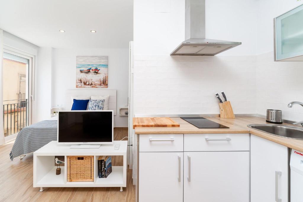 Kuchyň nebo kuchyňský kout v ubytování Apartamento Sol