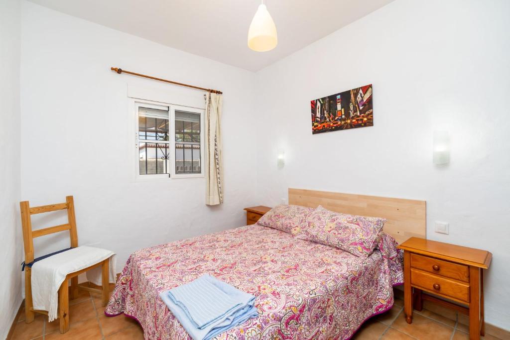 Postel nebo postele na pokoji v ubytování Casa Carlos con Piscina Privada en Conil