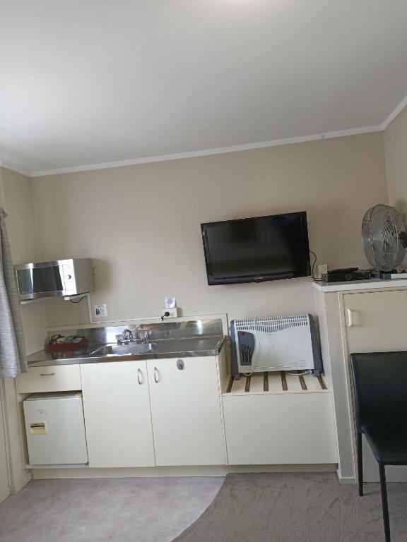 ASURE Macy's Motor Inn - Resim 26