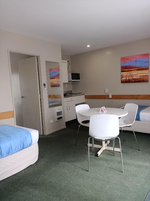 ASURE Macy's Motor Inn - Resim 5