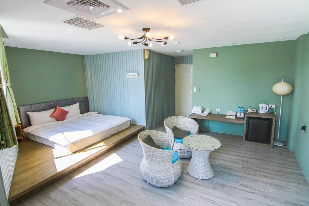 Postel nebo postele na pokoji v ubytování Sun Moon Lake Loft Inn