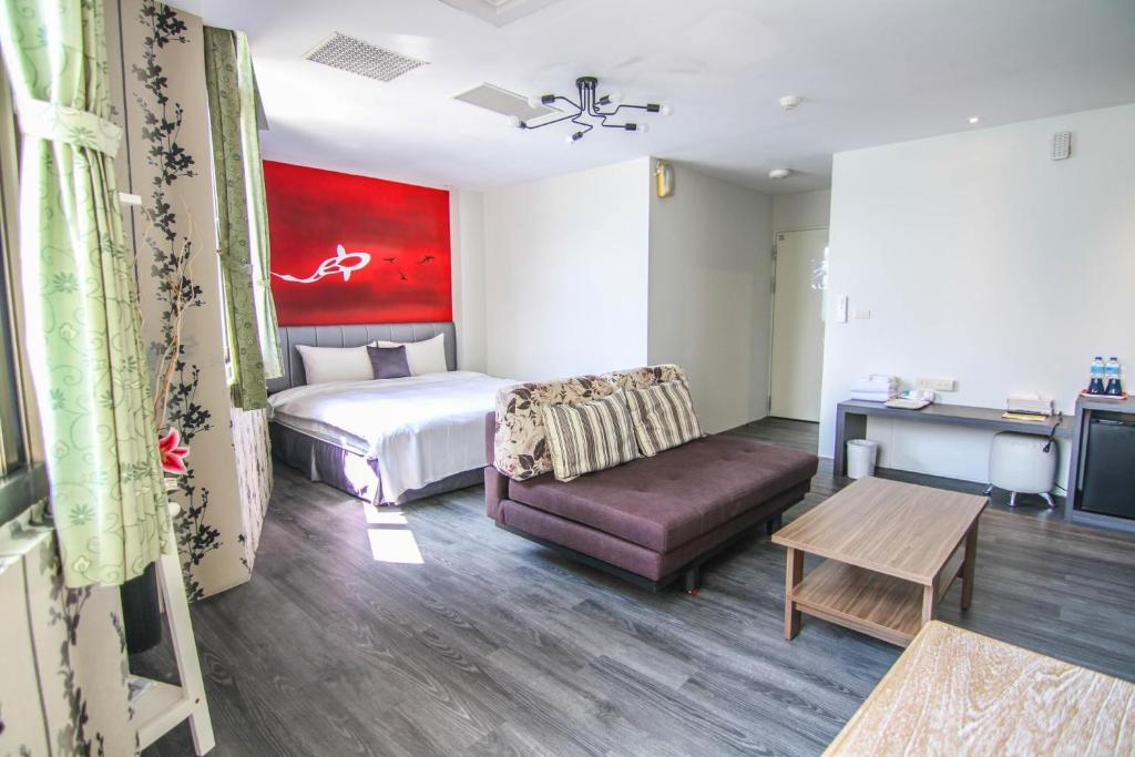Postel nebo postele na pokoji v ubytování Sun Moon Lake Loft Inn