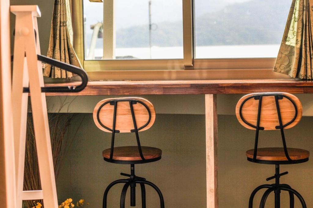 Fotografie z fotogalerie ubytování Sun Moon Lake Loft Inn v destinaci Yuchi