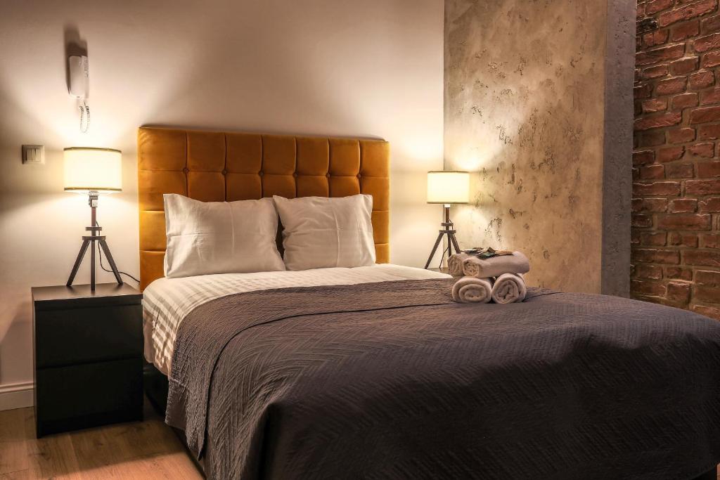 Кровать или кровати в номере Soft Loft 2 Apartment
