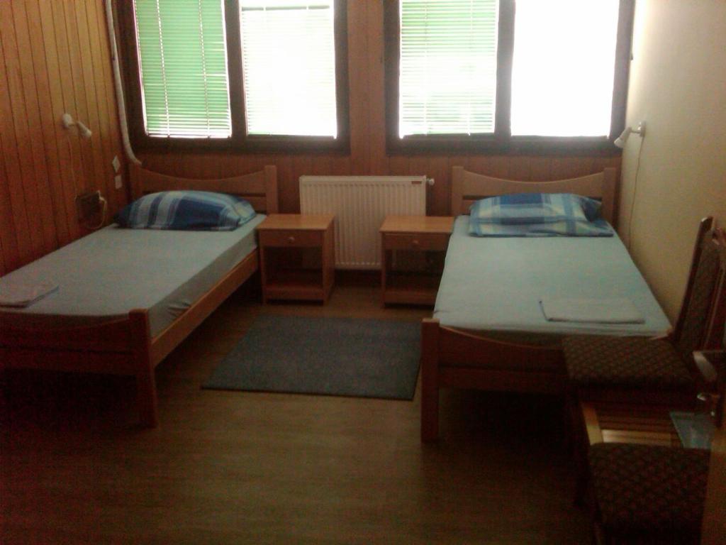 Postel nebo postele na pokoji v ubytování Hostel AV Palanka
