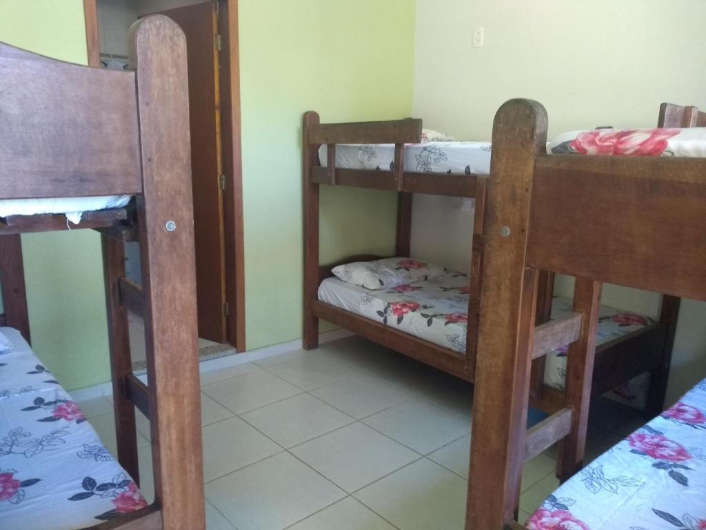 Postel nebo postele na pokoji v ubytování Harmoni Hostel & Pousada