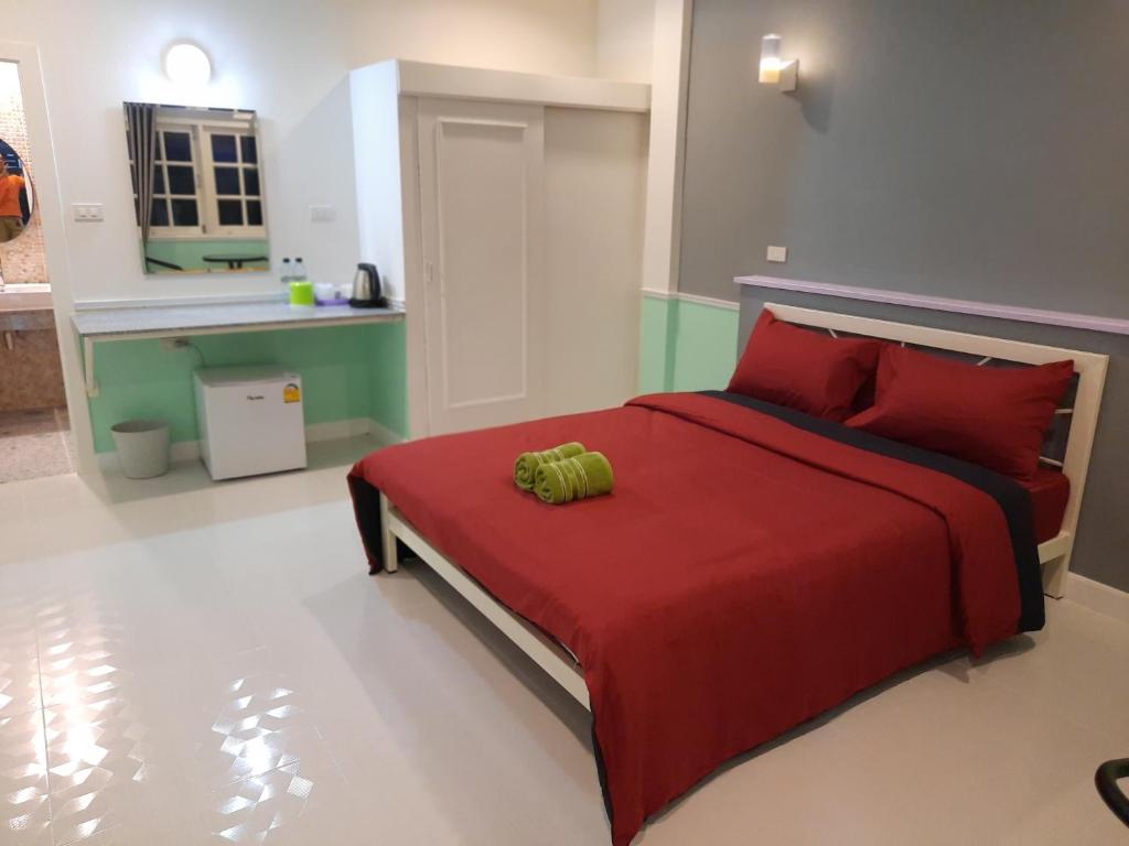 Postel nebo postele na pokoji v ubytování Fancy Carp Resort Hua-Hin