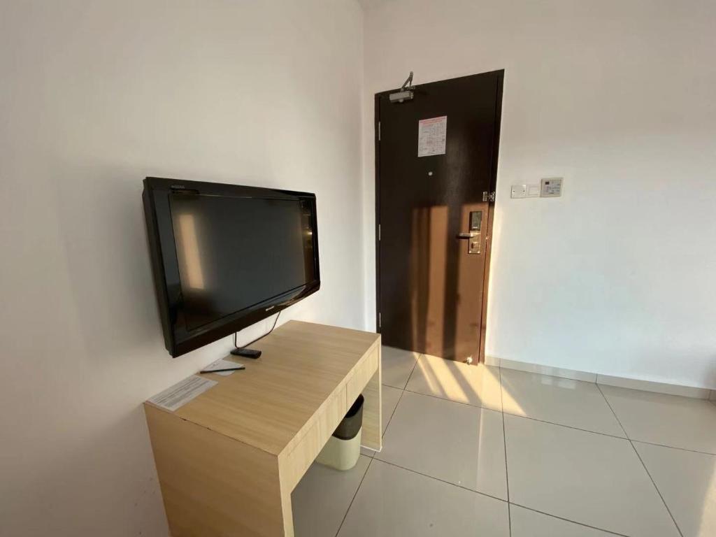 TV a/nebo společenská místnost v ubytování Swan Garden Hotel