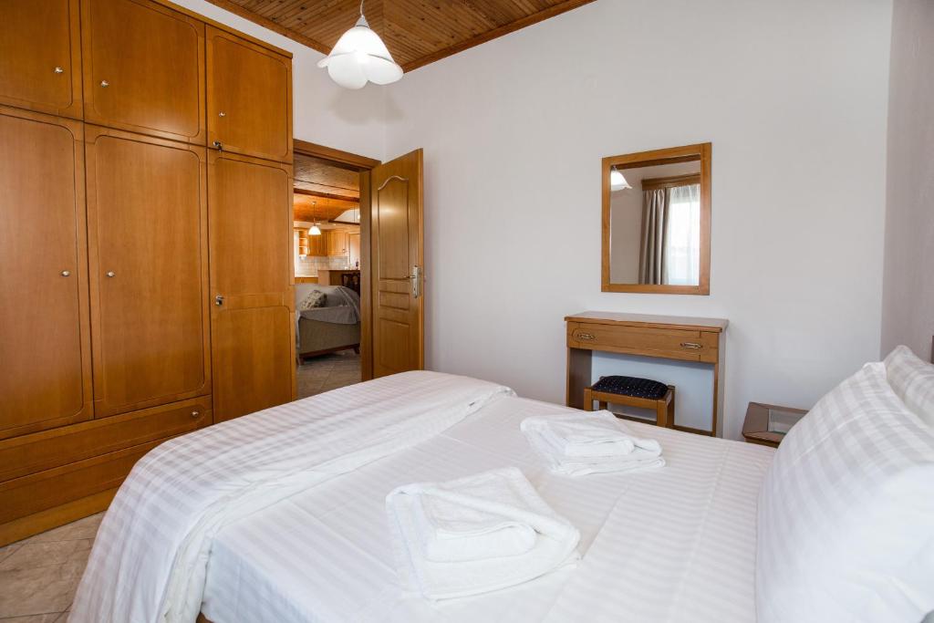 Postel nebo postele na pokoji v ubytování Filippos Hotel