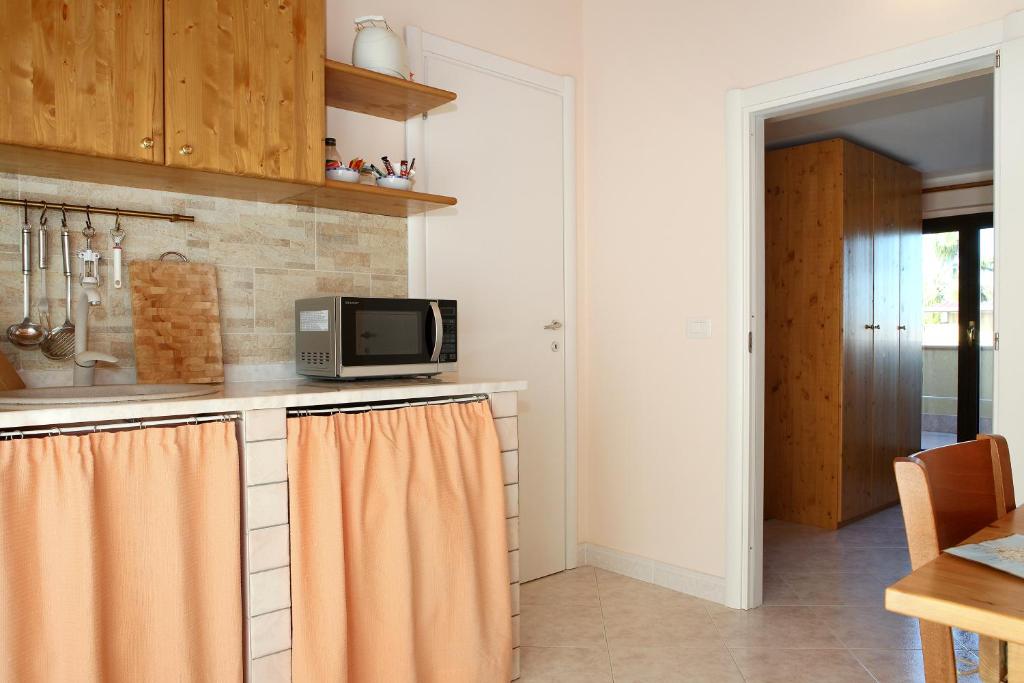 Kuchyňa alebo kuchynka v ubytovaní Adriana casa vacanze mare Etna Sicilia