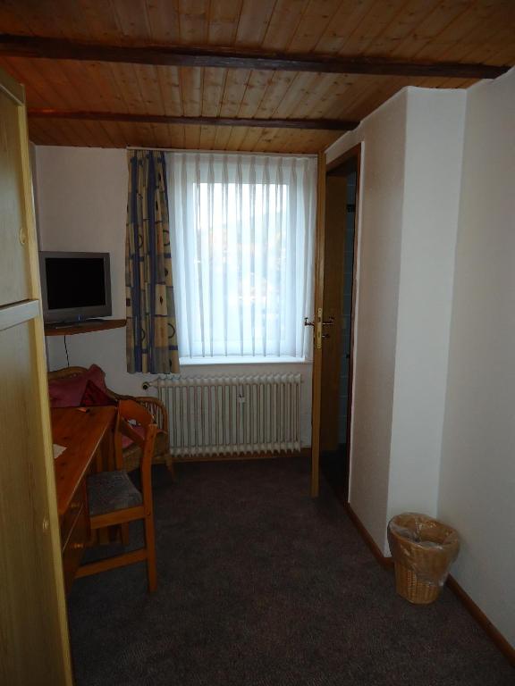 TV a/nebo společenská místnost v ubytování Hotel Kilian