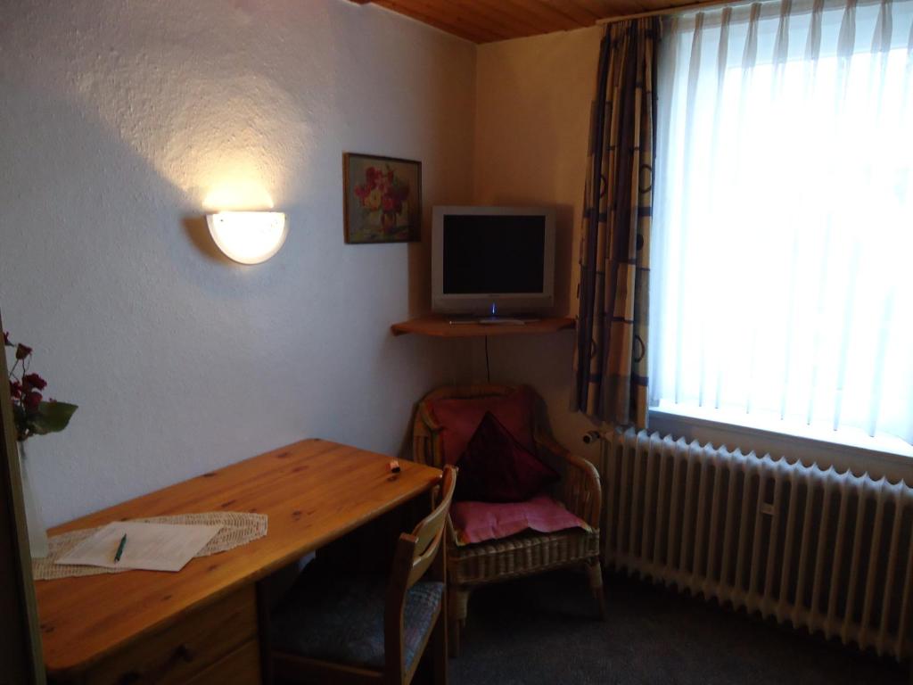 TV a/nebo společenská místnost v ubytování Hotel Kilian