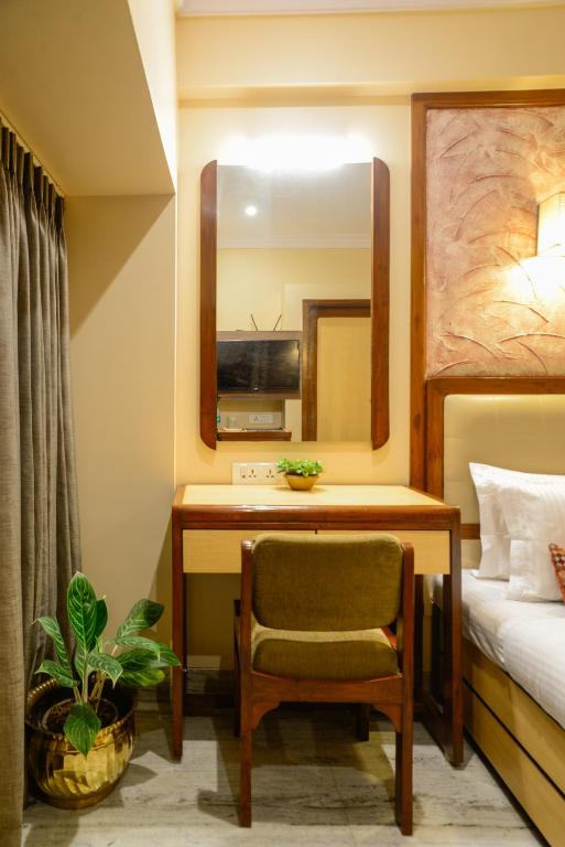 TV a/nebo společenská místnost v ubytování Hotel Ameya