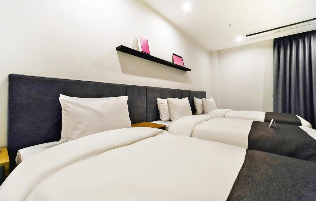 Hotel Noblestay - Habitación Triple De Lujo