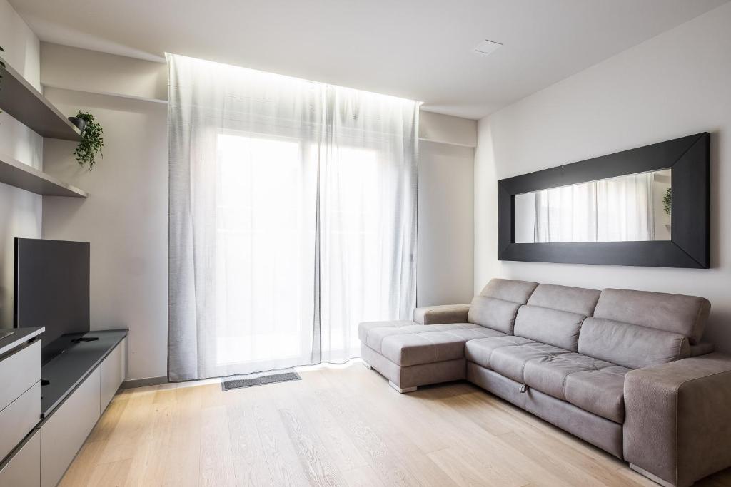 Televízia a/alebo spoločenská miestnosť v ubytovaní Residence Sant'Orsola - Pizzardi Suites Apartments