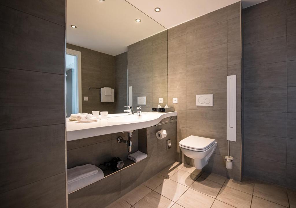 Koupelna v ubytování Aquatis Hotel