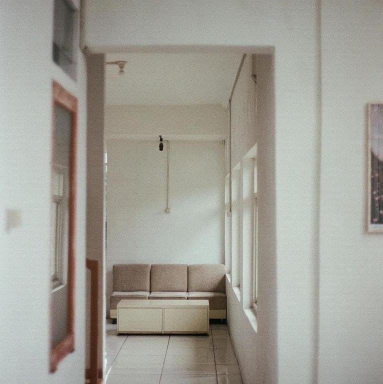Posezení v ubytování Tani Jiwo Hostel