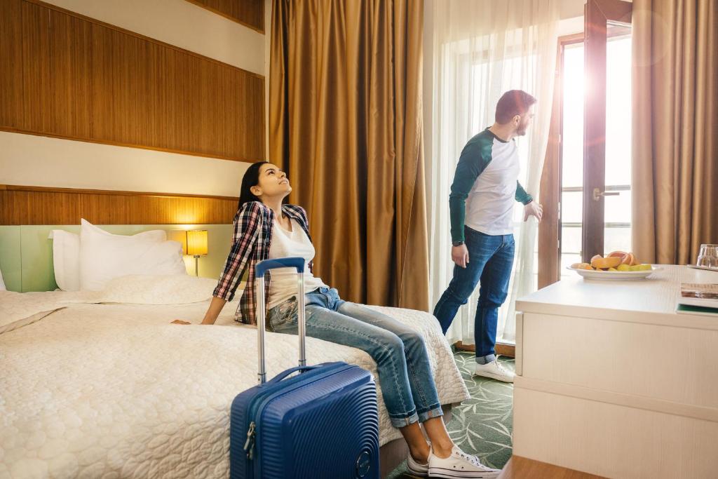 Postel nebo postele na pokoji v ubytování Villa Pinia Eco-hotel